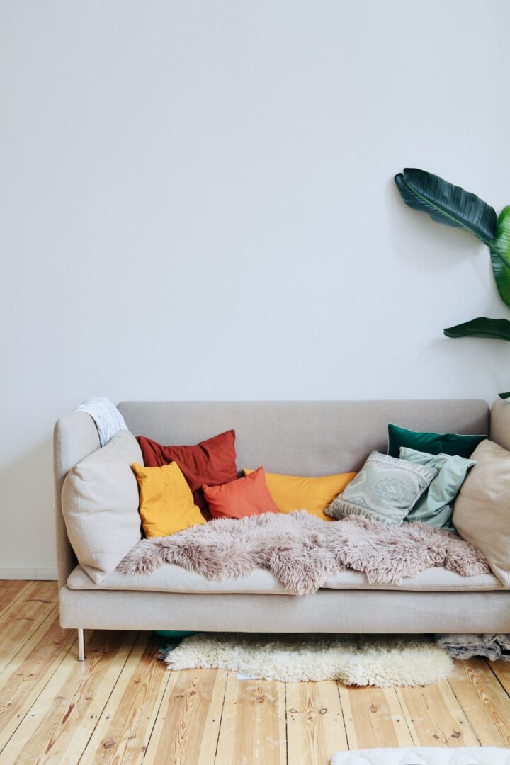 couch with colorful pillows